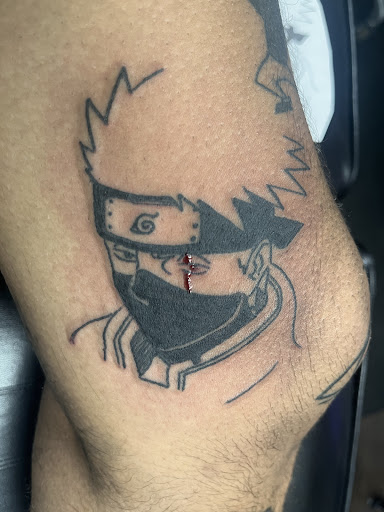 Explore maltese cross tattoo ideas, creative tattoo ideas in Jacksonville, available at Fat Kat Tattoo & Body Piercing