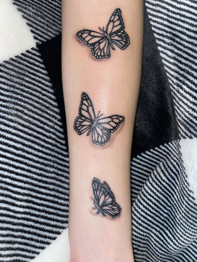 Explore lily tattoo ideas, creative tattoo ideas in Fort Worth, available at Spinning Needles Tattoos