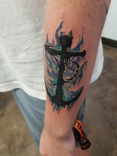 Explore ripped tattoo ideas, creative tattoo ideas in Denison, available at Calypso Tattoo