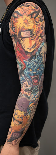 Explore dog bone tattoo ideas, creative tattoo ideas in Luverne, available at Conspiracy Tattoo MN