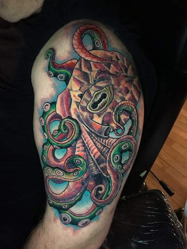 Explore paint tattoo ideas, creative tattoo ideas in Scranton, available at Tried N True Tattoo