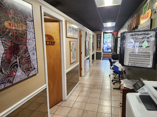 Explore blue bird tattoo ideas, creative tattoo ideas in Mohegan Lake, available at Big Joe & Sons Tattoo