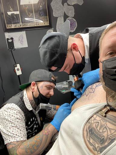 Explore tattoo ideas mechanic, creative tattoo ideas in Cadillac, available at Limitless Ink Tattoo Studio