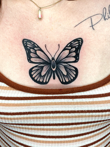 Explore boxing gloves tattoo ideas, creative tattoo ideas in Goose Creek, available at Red Kirin Tattoo