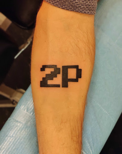 Explore nail tech tattoo ideas, creative tattoo ideas in Hebron, available at Explosive Ink Tattoo