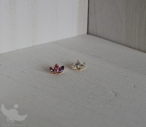 Explore mens quad tattoo ideas, creative tattoo ideas in Syracuse, available at Scarab Body Arts