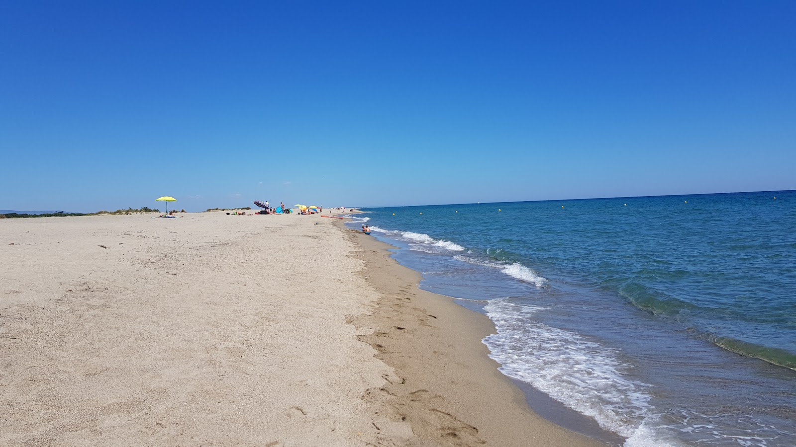 Φωτογραφία του St. Marie de la Mer beach II με φωτεινή άμμος επιφάνεια