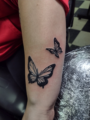 Explore lung cancer ribbon tattoo ideas, creative tattoo ideas in Owosso, available at Twisted ink tattoo