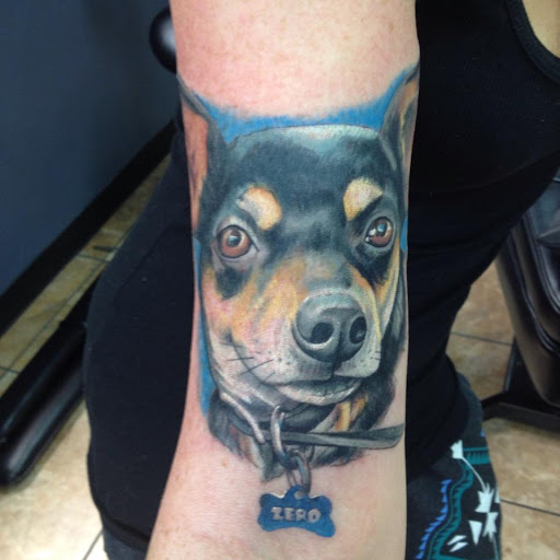 Explore dirtbike tattoo idea, creative tattoo ideas in Colorado Springs, available at West Side Tattoo