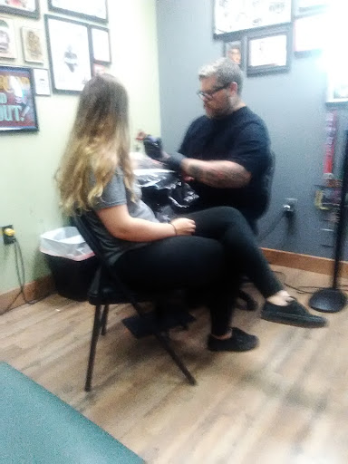 Explore religious cross tattoo ideas, creative tattoo ideas in Altoona, available at Custom Skin Art