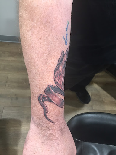 Explore rave tattoo ideas, creative tattoo ideas in Corning, available at Big Ink Tattoo & Piercing