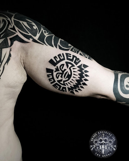 Explore skier tattoo ideas, creative tattoo ideas in Bronx, available at Brass Knuckles Ink Tattoo Studio