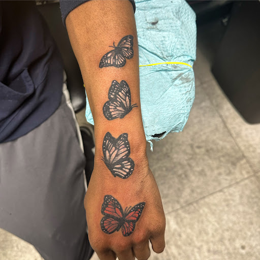 Explore cycling tattoo ideas, creative tattoo ideas in Hudson Falls, available at ALTERED ADDICTION TATTOOS