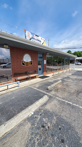 Explore floral tattoo cover up ideas, creative tattoo ideas in Clayton, available at Black Wolf Tattoos