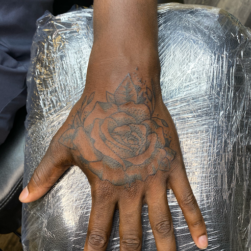 Explore tattoo cover up ideas for hand, creative tattoo ideas in Warner Robins, available at Untold Pain Tattoo Studio