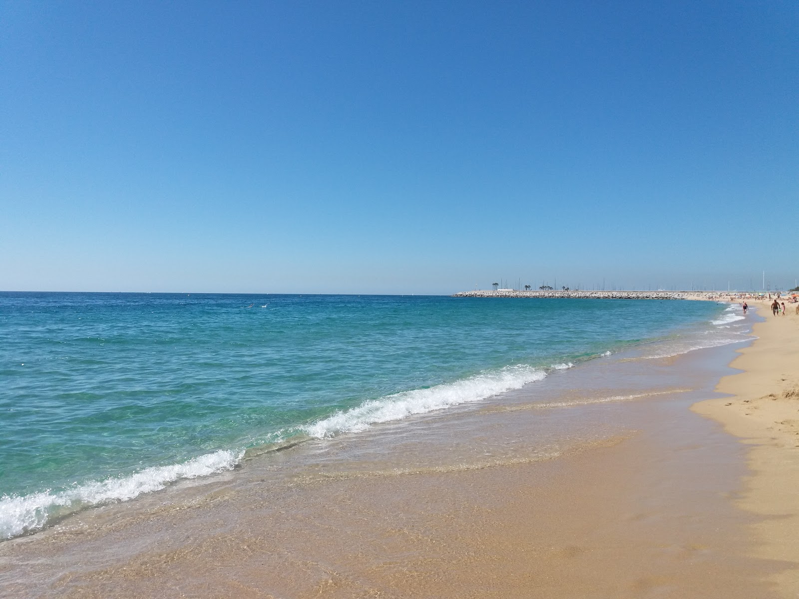 Foto av Playa Del Varador med turkosa vatten yta