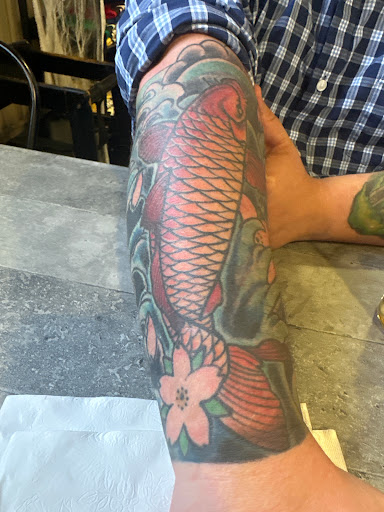 Explore nightmare on elm street tattoo ideas, creative tattoo ideas in Cincinnati, available at Wisteria Piercing & Tattoo