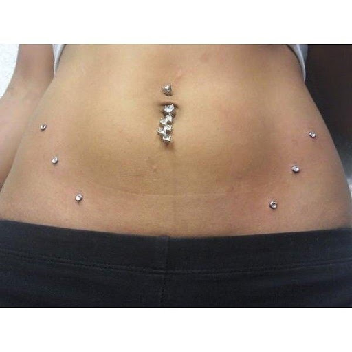 Explore tattoo ideas for couples names, creative tattoo ideas in Elko, available at Tom Custom Tattoos and Body Piercing Studio