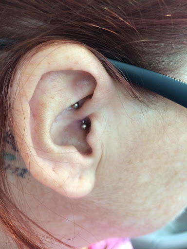 Tattoo Shop «Hot Spot Tattoo & Piercings», reviews and photos, 800 2nd St, Coralville, IA 52241, USA