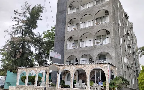 Le Village Hotel image