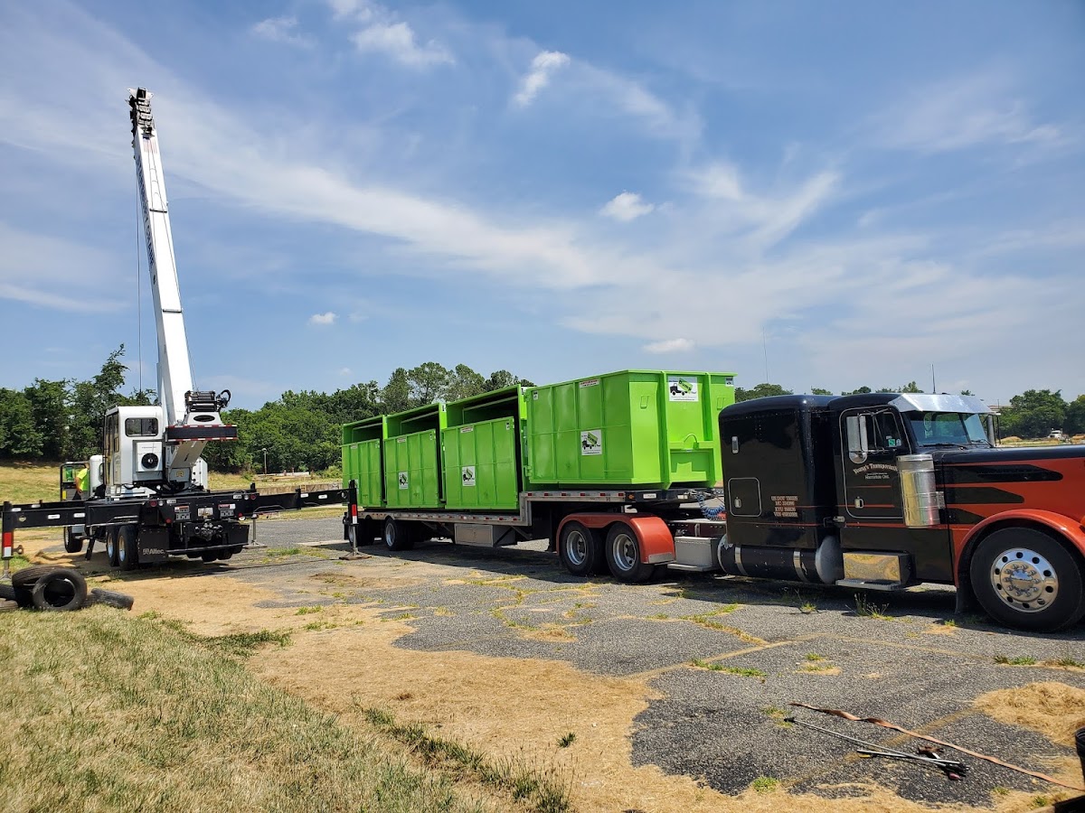 Stansbury provided crane service to unload a new shipment of dumpsters to our Baltimore facility