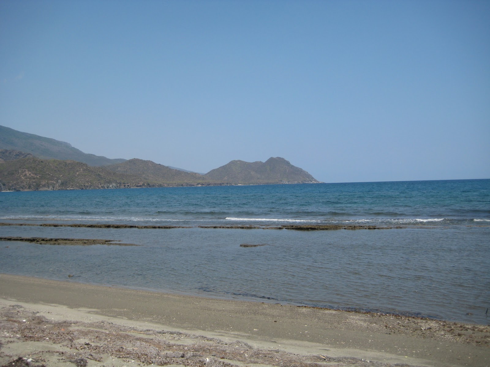 Foto van Playa Cardenero met helder zand oppervlakte