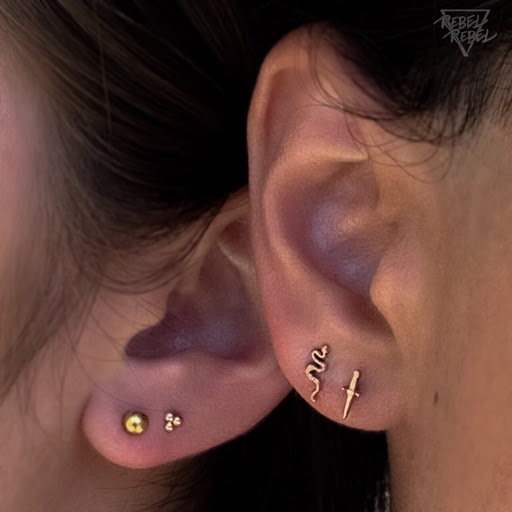 Explore rhea ripley tattoo ideas, creative tattoo ideas in Anaheim, available at Rebel Rebel Body Piercing