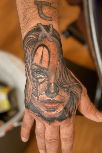 Explore men neck tattoo ideas, creative tattoo ideas in Fairfax, available at Dixer