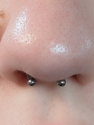 Explore emperor's new groove tattoo ideas, creative tattoo ideas in Merrillville, available at Impulse Body Piercing and Fine Jewelry