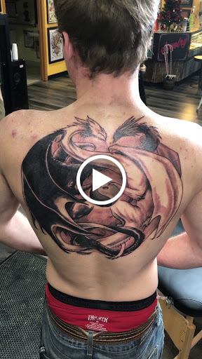 Explore dad and daughter tattoo ideas, creative tattoo ideas in Duluth, available at Gitchee Gumee Tattoo