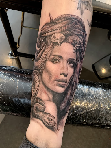 Explore pool tattoo ideas, creative tattoo ideas in Orange Park, available at Revelation Tattoo company