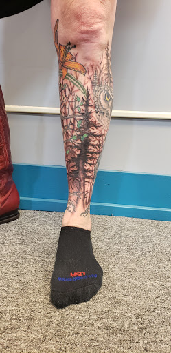 Explore men's behind the ear tattoo ideas, creative tattoo ideas in Superior, available at INK Tattoo