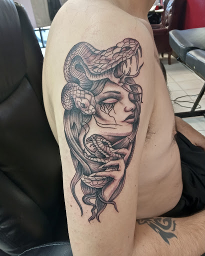 Explore mens tattoo ideas upper arm, creative tattoo ideas in La Porte, available at Archaic tattoos La Porte TX Custom Tattoo Shop
