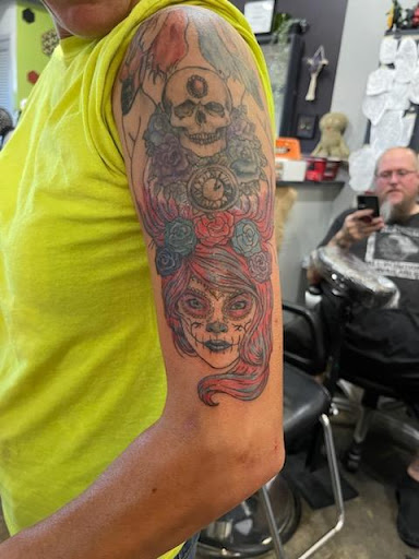 Explore men's memorial tattoo ideas, creative tattoo ideas in Bloomington, available at Crimson Breed Tattoo Studio