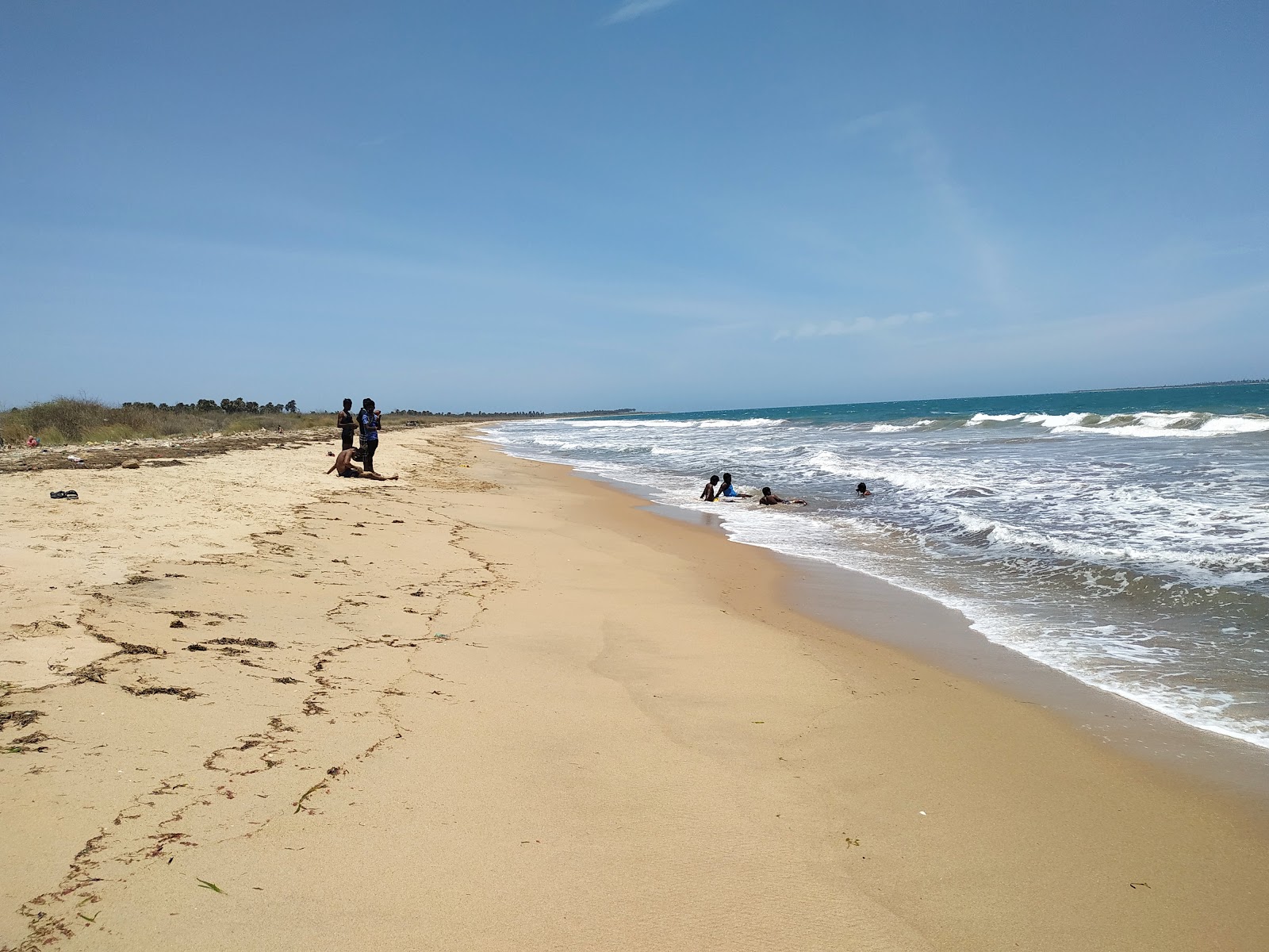 Mariyur Beach的照片 带有碧绿色纯水表面