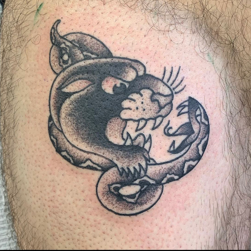 Explore nigerian tattoo ideas, creative tattoo ideas in Uvalde, available at Artistik Kreationz 96