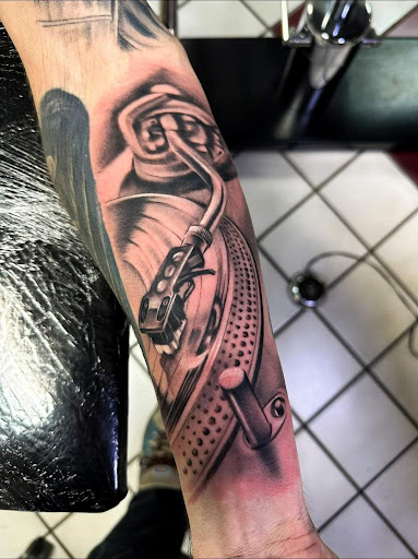 Explore tattoo cover up ideas for ladies, creative tattoo ideas in Grand Ledge, available at Van Gogh Tattoos