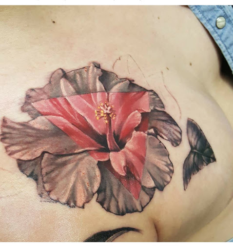 Explore fish tattoo ideas for females, creative tattoo ideas in Millsboro, available at Tattoo Galaxy (Millsboro) Piercing & Custom tattoos