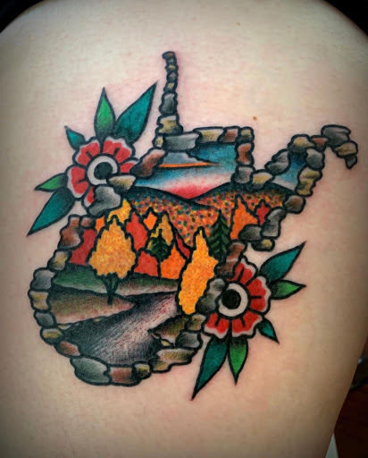 Explore clock hand tattoo ideas, creative tattoo ideas in Morgantown, available at Wild Zero Studios