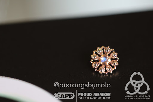 Explore back tattoos for men ideas, creative tattoo ideas in Charleston, available at MOLA Piercing and Fine Jewelry