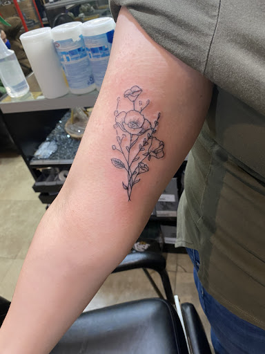 Find women's rib tattoo ideas for your next unique tattoo in Venice at House of Ink