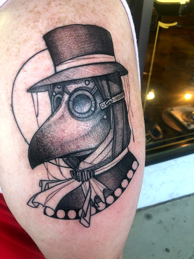 Explore ankle bracelet tattoo ideas, creative tattoo ideas in Marietta, available at The Queen Bee Tattoo and Piercing Parlour