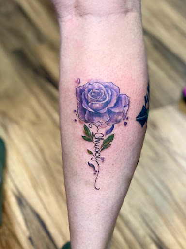 Find small tattoo between breast ideas for your next unique tattoo in Powell at Elysium Body Enhancements