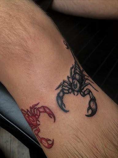 Explore john deere tattoo ideas, creative tattoo ideas in North Tonawanda, available at Dark Side Ink Tattoo Studio