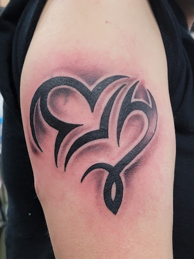 Explore cover up foot tattoo ideas, creative tattoo ideas in Fargo, available at Golden Dragon Tattoo