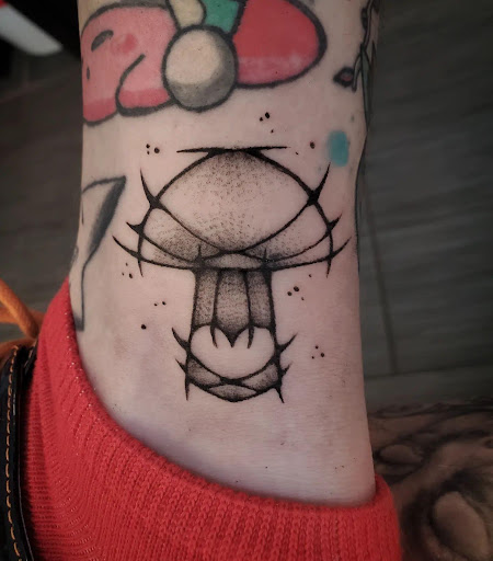Find dali tattoo ideas for your next unique tattoo in Palm Harbor at Angry Owl Tattoo and Piercing