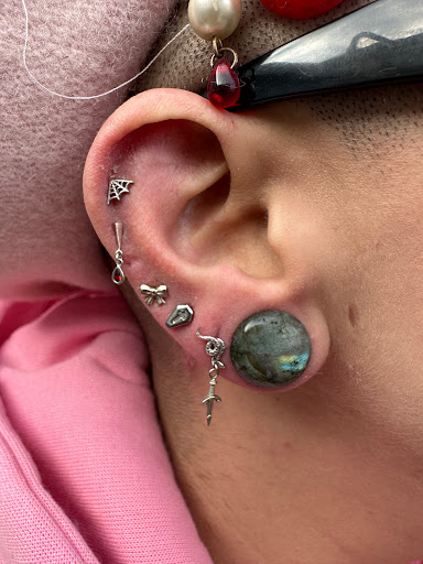 Explore playing card tattoo ideas, creative tattoo ideas in Bloomington, available at Crystal Moon Body Arts