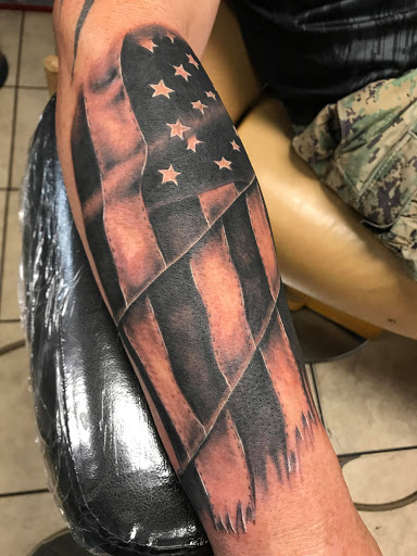 Explore tank tattoo ideas, creative tattoo ideas in Powell, available at Against All Odds Tattoos and Piercings