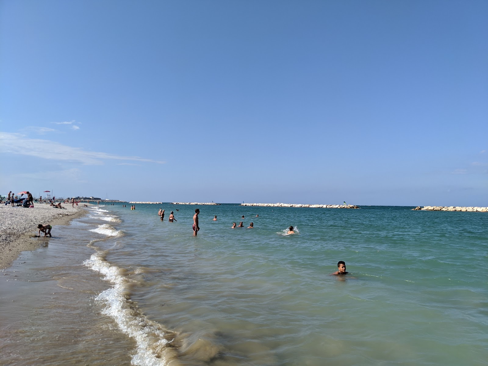 Fotografie cu Spiaggia Sassonia di Fano zonă de stațiune de pe plajă
