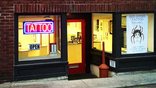 Explore lioness tattoo ideas for females, creative tattoo ideas in Putnam, available at Red Spider Tattoo